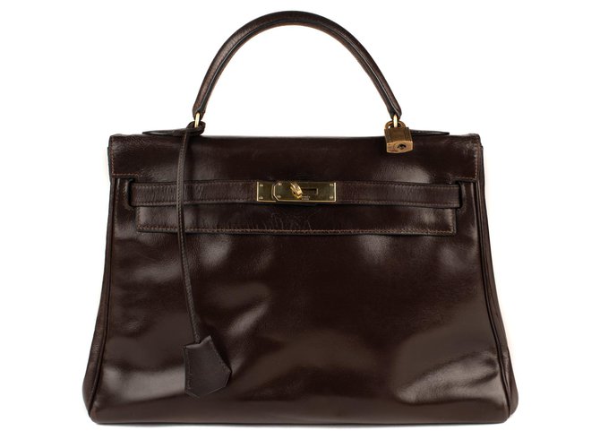 Sac Hermès Kelly vintage en cuir box marron, bijouterie dorée en bon état !  ref.117212