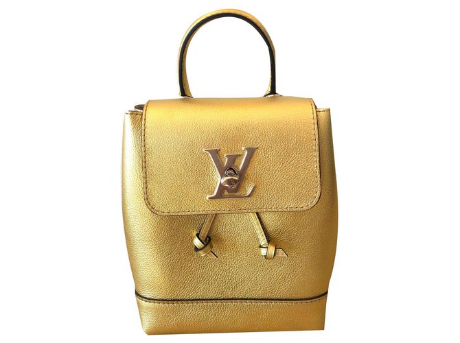 Twist louis Vuitton LockMe Mini Gold Golden Leather  ref.117788