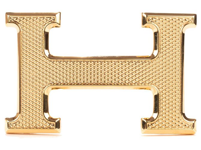 Boucle de ceinture Hermès H modèle "Guillochée" doré état neuf! Métal  ref.118378