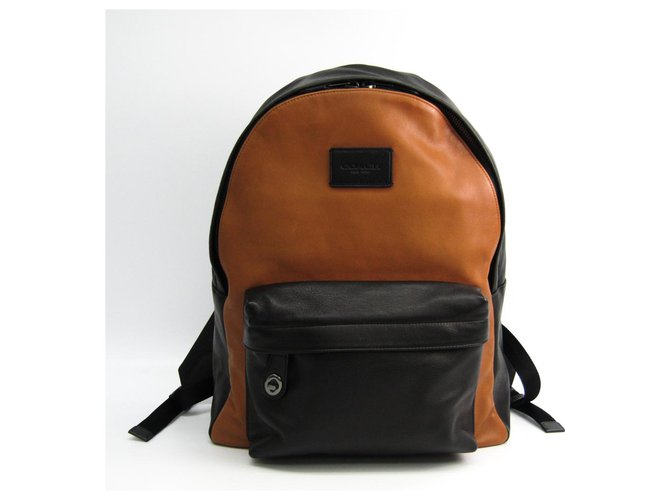 coach black and brown backpack