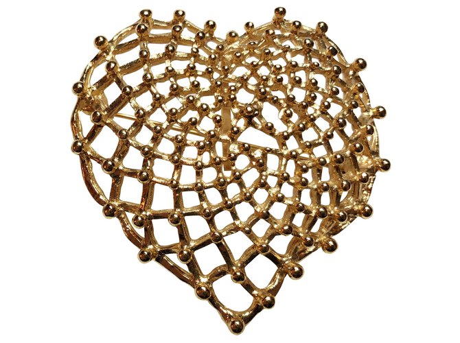 Yves Saint Laurent Broche pendentif coeur doré Métal  ref.121509
