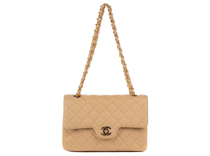 Timeless Excelente Chanel 23 cordeiro acolchoado bege em muito bom estado!
