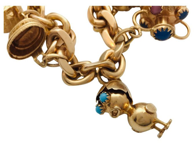 inconnue Charm bracelet in yellow gold and colored stones.  ref.122386