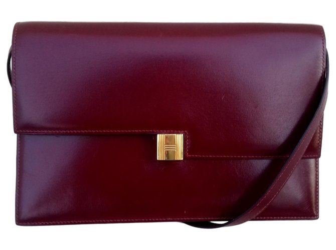 Hermès Vorhängeschloss-Handtasche Rot Leder  ref.122387