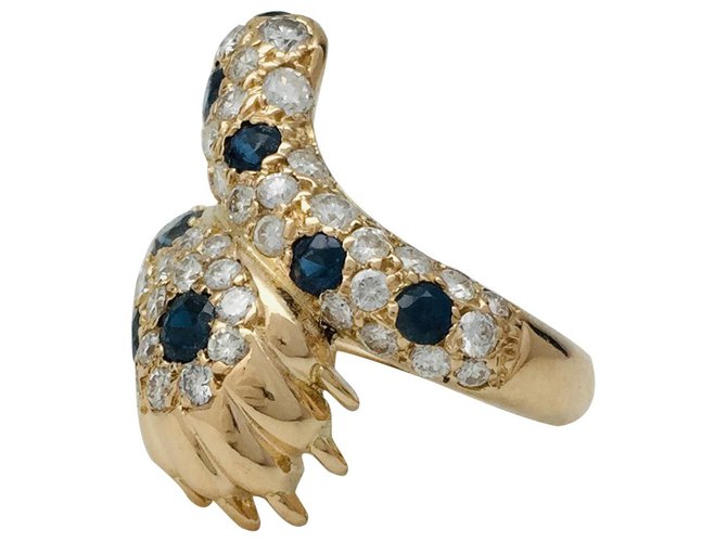 inconnue Claw ring in yellow gold diamonds and sapphires.  ref.122460