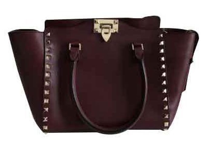 Bolsa Valentino Rockstud em pele cor de vinho Bordeaux