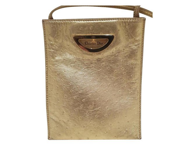 dior gold clutch bag