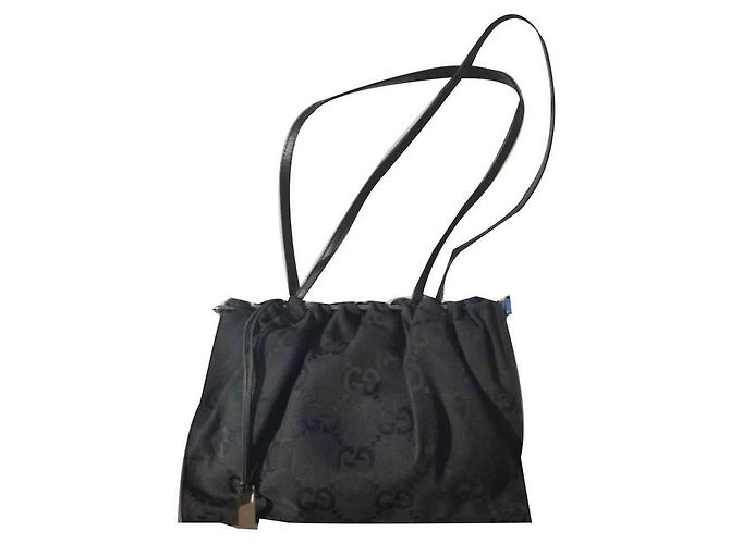Bolsa Gucci preta de tecido Preto