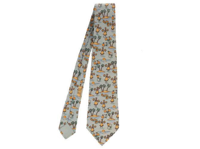 Hermès silk tie patterned "palm tree & tahitian dancer" in very good condition! Light blue  ref.124702