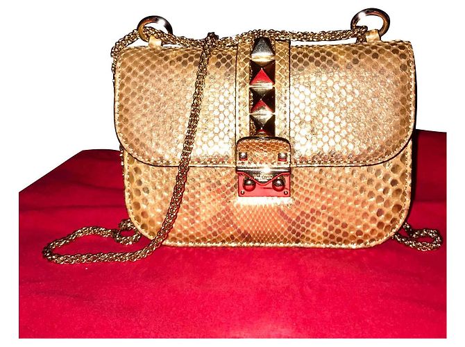 Valentino Garavani Croix en python doré édition limitée Rockstud Bronze