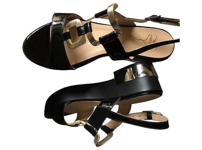Autre Marque Mules compensées ECHO en cuir verni noir