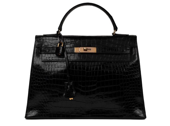 Hermès Superb Hermes Kelly 32 black Porosus Crocodile saddle, gold-plated jewelery, In very good condition ! Exotic leather  ref.125518