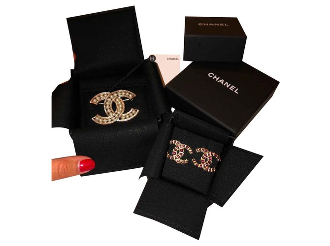 Chanel CC Dourado Aço  ref.125801