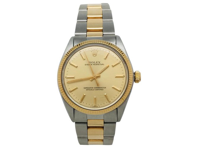 Relógio Rolex "Oyster Perpetual" em ouro amarelo e aço.  ref.126023