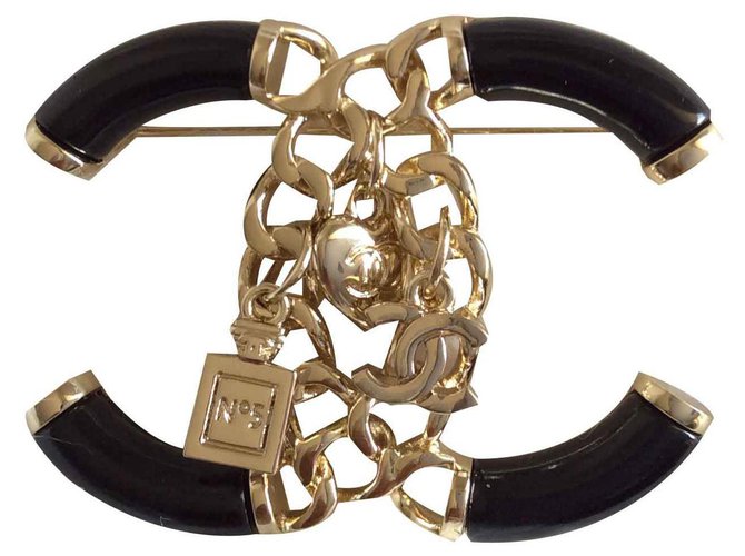 Chanel Pins & brooches Black Metallic Metal  ref.127715