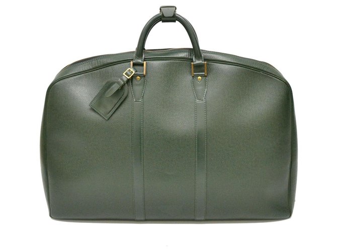 Bolsa de viaje Louis Vuitton Taiga Verde Cuero  ref.128297