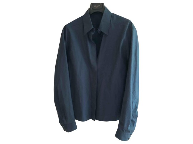 Alaïa Blusa de algodón azul marino con mangas de volumen.  ref.128663