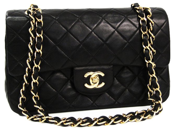 Chanel Noir Classique Moyen Flap Doublé En Peau De Veau Cuir  ref.129332