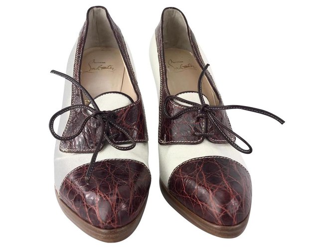 Christian Louboutin - Chaussures à lacets bicolores à lacets, Marron blanc, UE 41 Cuir Toile Blanc cassé  ref.129544
