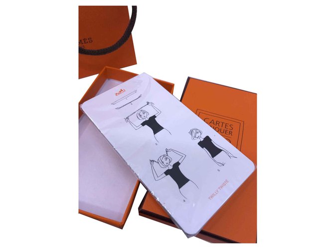 Hermès Card to tie White Orange Plastic  ref.126995