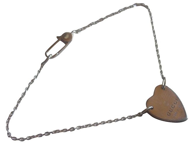 Pulsera corazón Gucci en plata de ley. 925