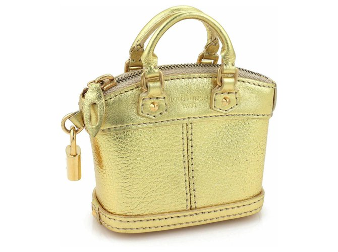 Louis Vuitton limited Edition bag jewelry Golden Leather  ref.131061