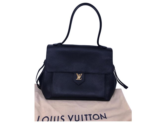 Louis Vuitton Lock Me PM-Tasche Schwarz Leder  ref.133797