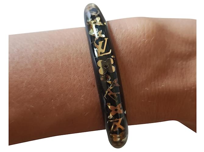 Louis Vuitton, Inclusione del braccialetto Nero D'oro Plastica Resina  ref.134815