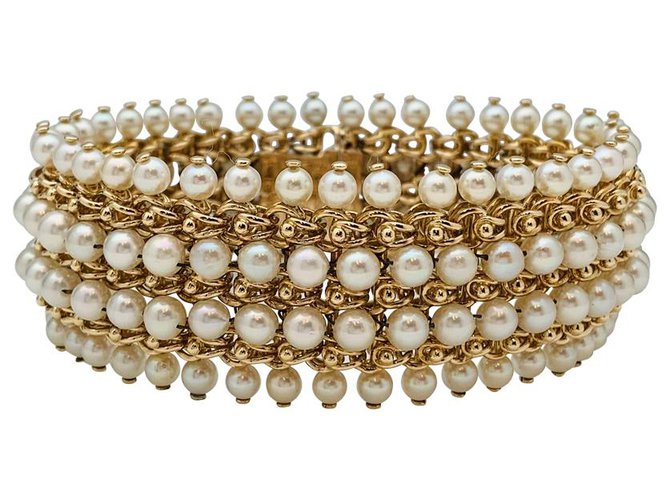 Large Bulgari bracelet in yellow gold and pearls.  ref.135348