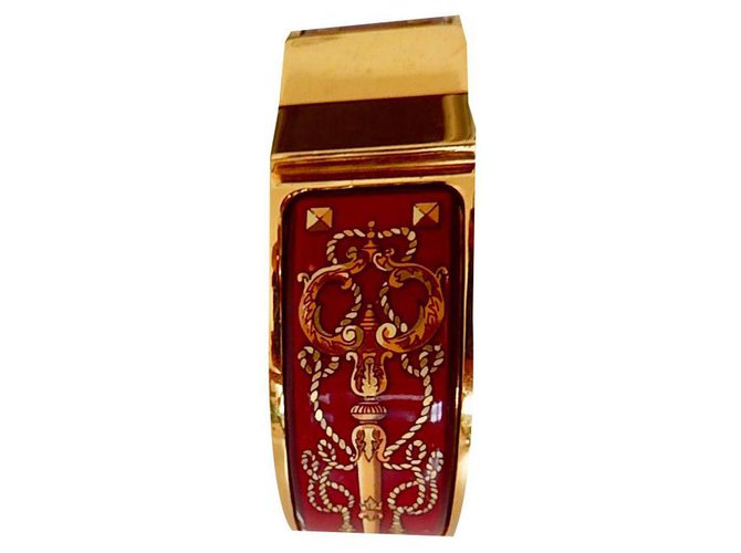 Hermès: Clic Clac enamel bracelet 1era generation. Gold-plated finish. 6,5cm Multiple colors  ref.136021