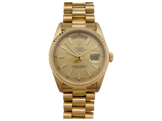 Montre Rolex "Day-Date" en or jaune sur bracelet président en or jaune.  ref.136037