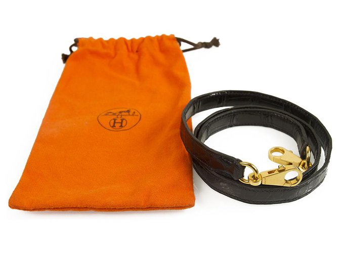 Hermès Hermes Kelly couro de crocodilo com pulseira de ouro em excelente estado Preto Couros exóticos  ref.137100