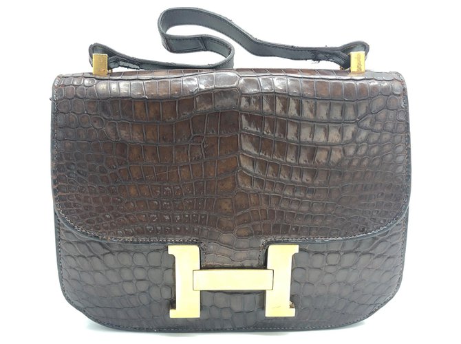 Hermès Sac vintage Hermes Kelly Constance en crocodile brun Cuirs exotiques Marron  ref.137189