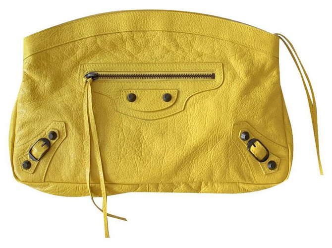 Clutch bag Balenciaga Classic yellow leather studs Lambskin  ref.137336