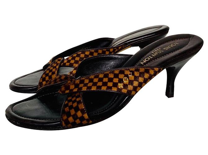 Louis Vuitton Damier Sauvage Marrom