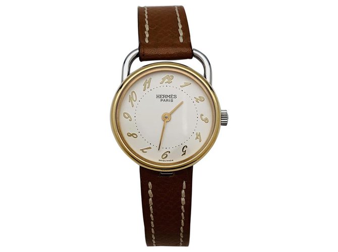 Hermès "Arceau" watch in gold and steel on leather. Small model.  ref.139124