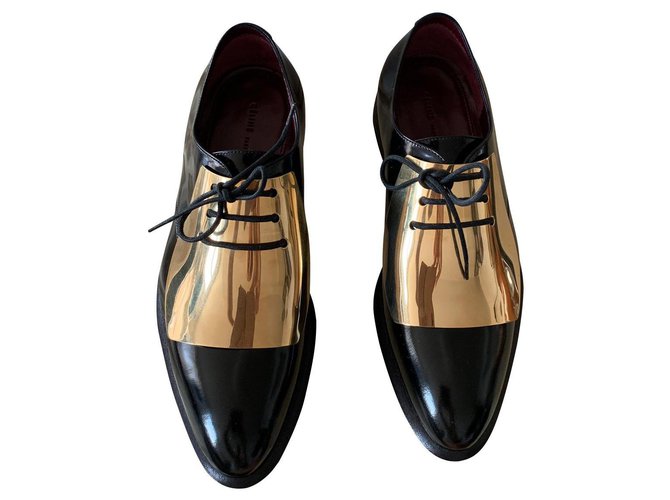 Pair of black and gold patent leather derbies Céline  ref.139133