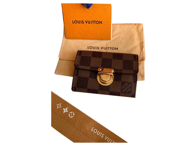Louis Vuitton Purses, wallets, cases Brown Cloth  ref.140464