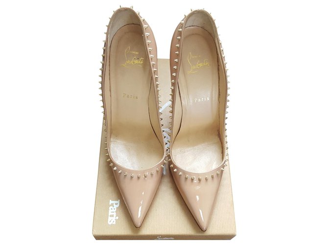 Christian Louboutin Calcanhares Carne Couro envernizado  ref.140525