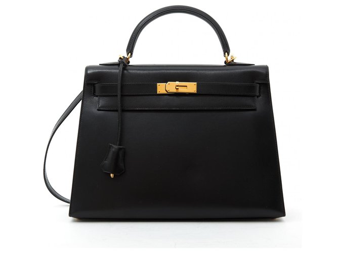 Kelly Hermès Handbags Black Golden Leather Metal  ref.140533
