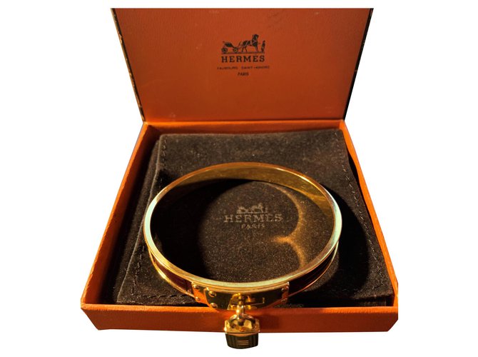 Magnífica pulseira Hermès "KELLY" Anel em banhado a ouro e couro de crocodilo Bordeaux Couros exóticos  ref.140806