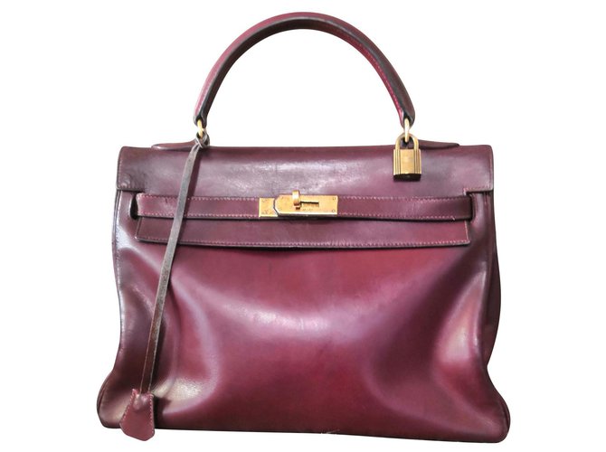 Sublime vintage Hermès Kelly bag Dark red Leather  ref.142481