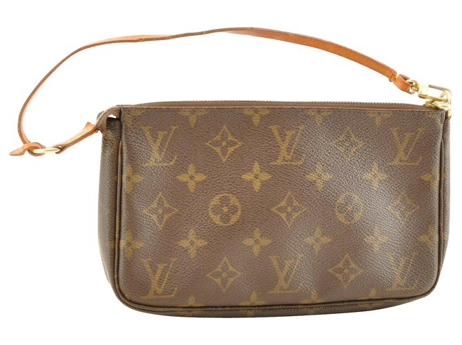 Pochette accessoire cloth handbag Louis Vuitton Brown in Cloth