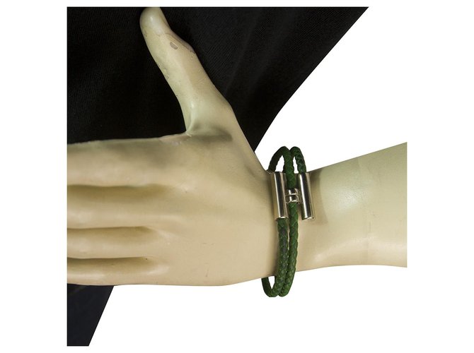 Hermès Hermes Tournis Tresse bracelet in green Swift calfskin with palladium plated hardware Leather  ref.144415
