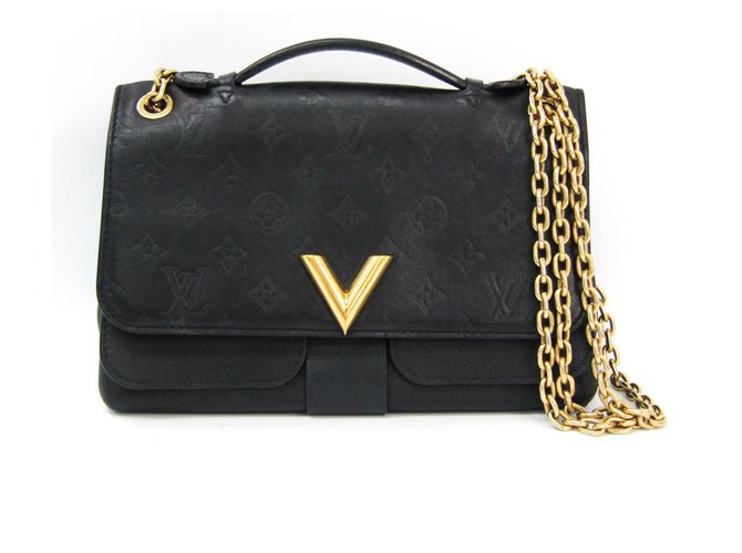 Bolso con cadena de cuero muy monograma negro Louis Vuitton Dorado  ref.144479