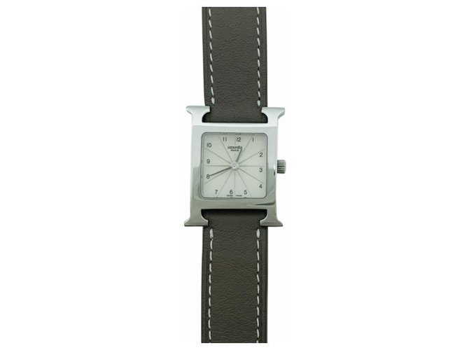 Reloj Hermès modelo "Heure H", acero sobre cuero.  ref.144551