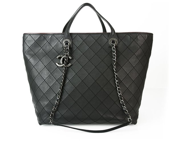 Chanel Tote Extra Grande Puntada Negra Salvaje 2 Way Tote Bag Gunmetal CC Hardware Negro Cuero  ref.144605