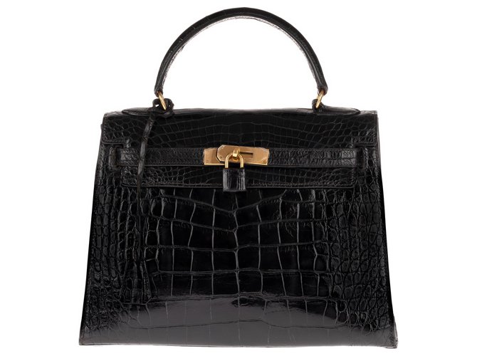 Hermès Superb Hermes Kelly 28 black Porosus Crocodile saddle, gold plated hardware in very good condition! Exotic leather  ref.145136