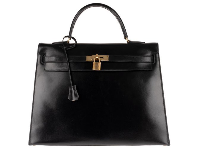 Hermès Hermes Kelly 35 sela de couro caixa preta, hardware banhado a ouro em bom estado +! Preto  ref.145409