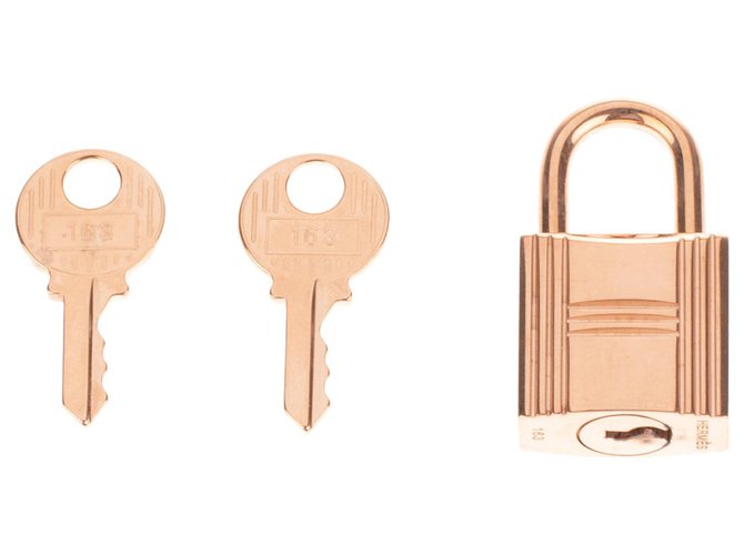 Hermès Lucchetto dorato di Hermes per borse Birkin in oro kelly, nuova condizione con 2 chiavi e custodia originale! D'oro Metallo  ref.145433
